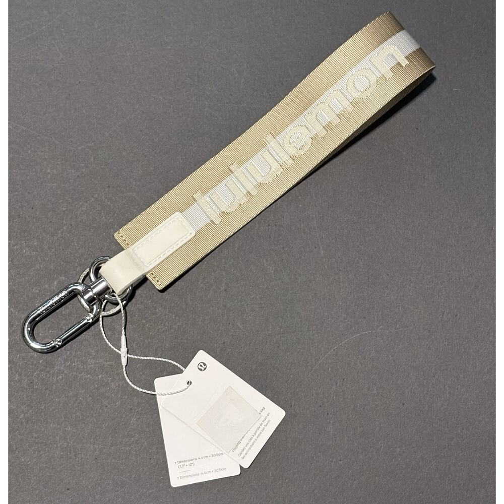 Lululemon Never Lost Key Chain Gold White Silver Hardware RETIRED DESIGN NWT